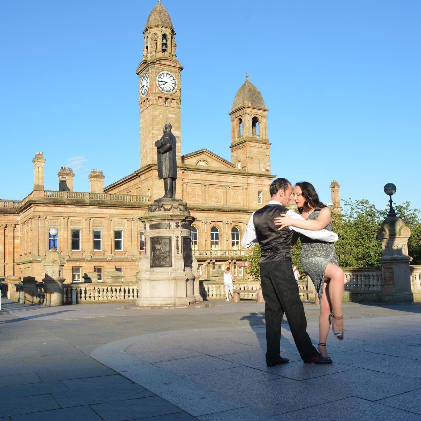 Drew & Taryn dancing in Paisley with the Town Hall in background.